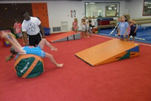 Sweat Treat Summary Camp gymnastics
